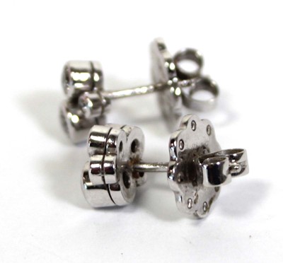 Lot 703 - A pair of platinium and diamond set 'Raindance'...