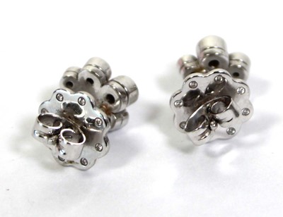 Lot 703 - A pair of platinium and diamond set 'Raindance'...