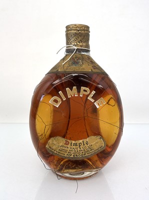 Lot 13 - An old bottle of John Haig & Co Dimple Scotch...