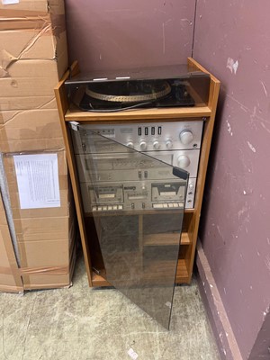 Lot 118 - A teak veneered hi-fi cabinet containing...
