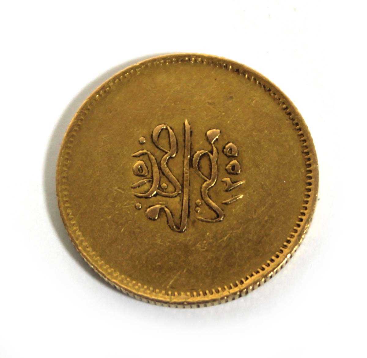 Lot 401 - An Egyptian yellow metal coin, 8.4 gms
