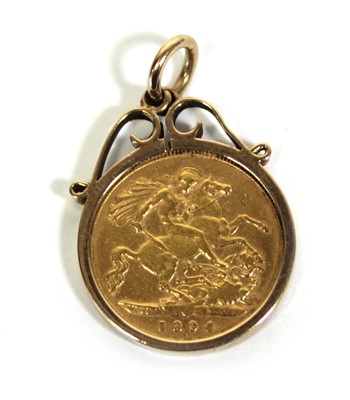 Lot 402 - A 9ct yellow gold pendant set a Victorian half...