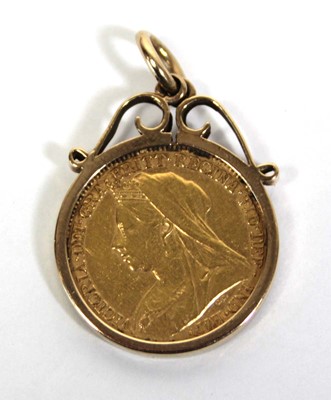 Lot 402 - A 9ct yellow gold pendant set a Victorian half...