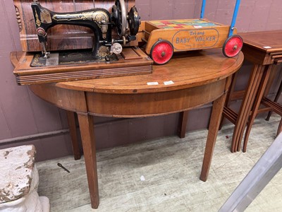 Lot 58 - A late Victorian mahogany demi-lune hall table