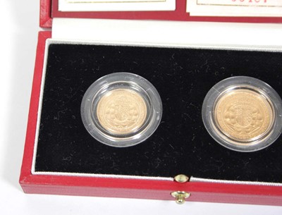 Lot 419 - A Royal Mint two-coin sovereign and half...