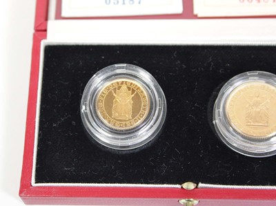 Lot 419 - A Royal Mint two-coin sovereign and half...