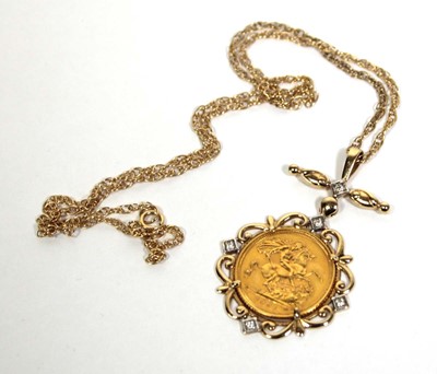 Lot 420 - A Royal Mint 14ct yellow gold pendant necklace...