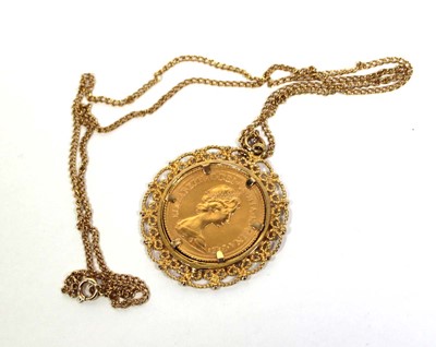 Lot 421 - A 9ct yellow gold pendant necklace set...