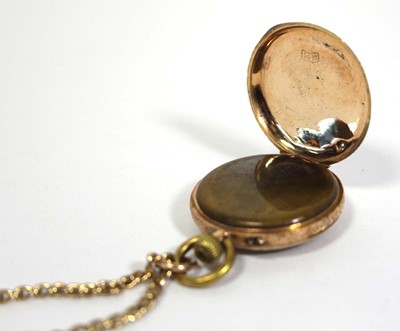 Lot 452 - A 14ct yellow gold open face fob watch, the...