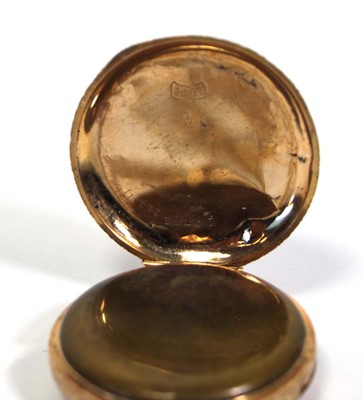 Lot 452 - A 14ct yellow gold open face fob watch, the...