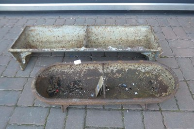 Lot A weathered cast iron two sectioned feeding...