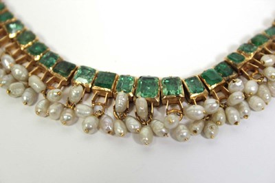 Lot 710 - An Indian cord and yellow gold necklace...