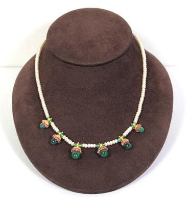 Lot 711 - A single strand cultured pearl necklace...
