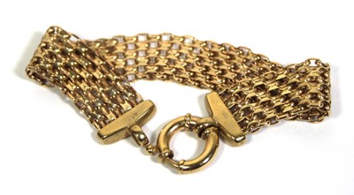 Lot 713 - A 9ct yellow gold meshlink bracelet, l. 19 cm,...