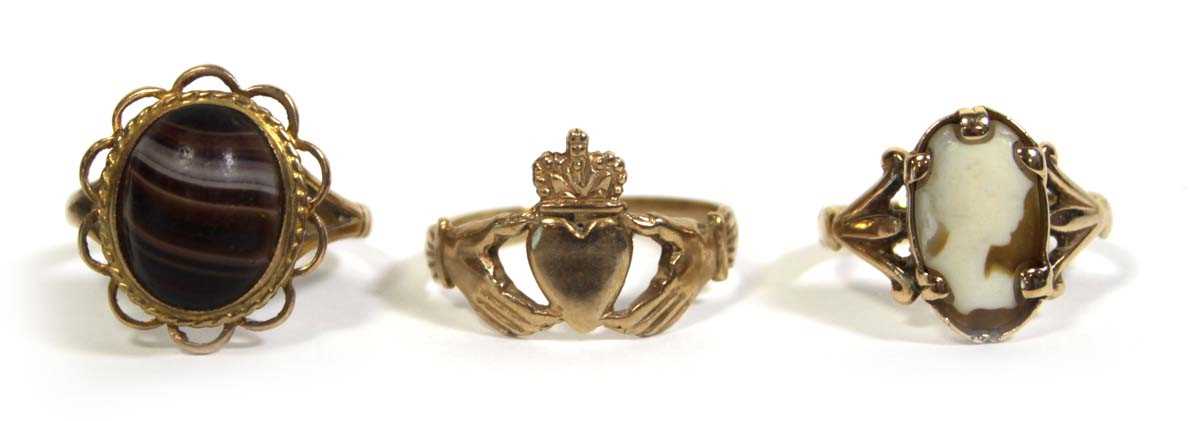 Lot 718 - A 9ct yellow gold claddagh ring, London 1987,...