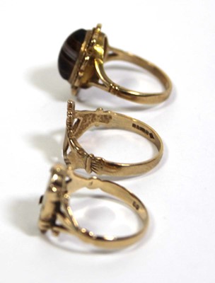 Lot 718 - A 9ct yellow gold claddagh ring, London 1987,...