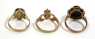 Lot 718 - A 9ct yellow gold claddagh ring, London 1987,...