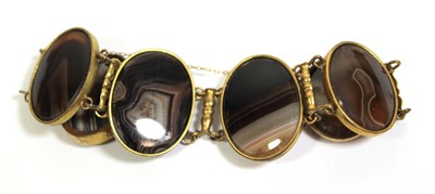 Lot 720 - A gilt metal mounted banded agate bracelet, a...