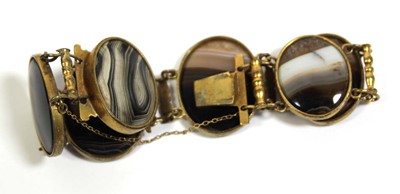 Lot 720 - A gilt metal mounted banded agate bracelet, a...