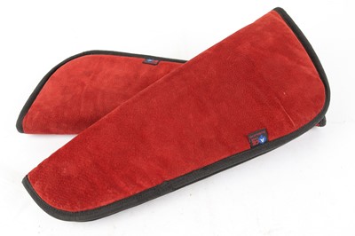Lot 1195 - Two red padded Ace pistol slips