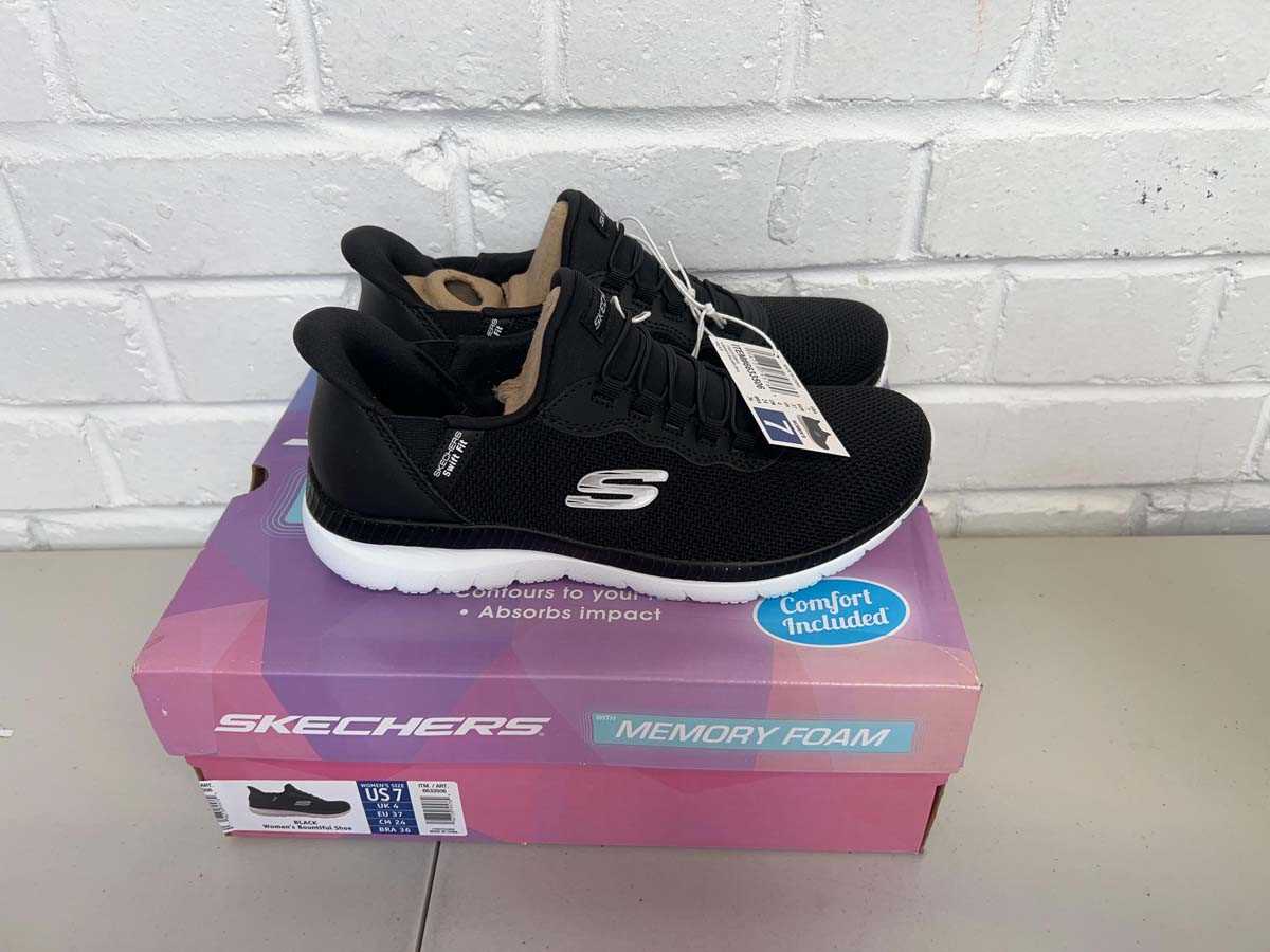 Lot Boxed pair of Skechers hands free swift fit...