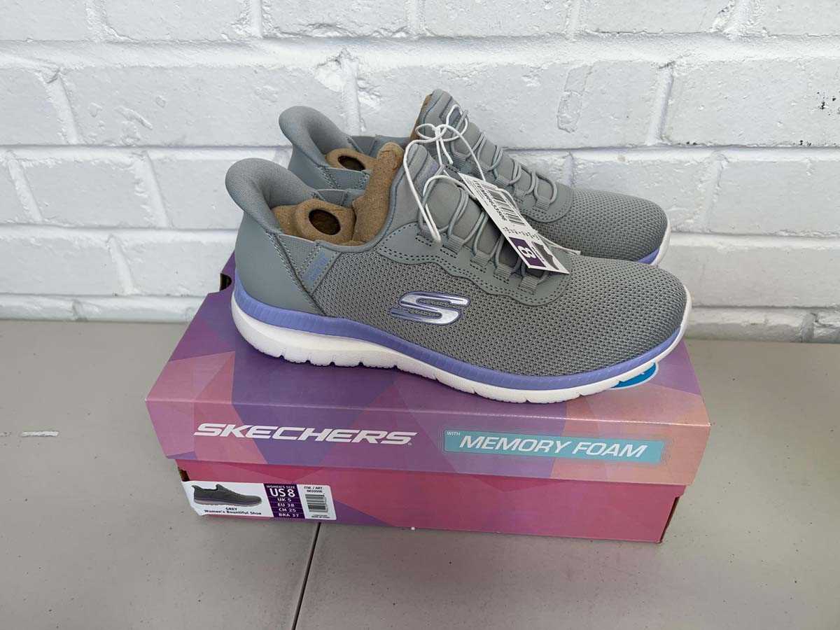 Lot Boxed pair of Skechers hands free swift fit...