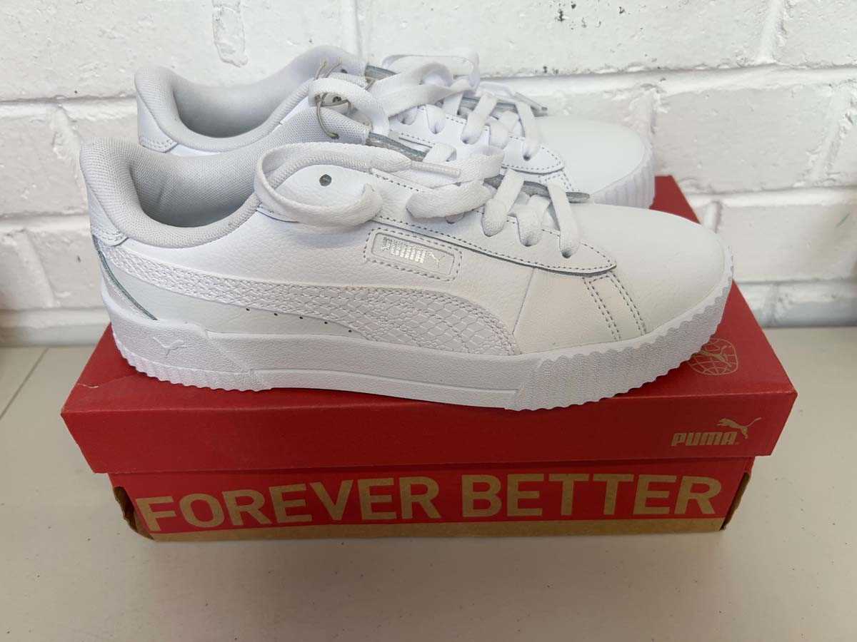 Lot Boxed pair of Puma crew snake trainers size UK...