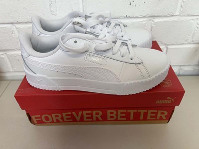 Lot Boxed pair of Puma crew snake trainers size UK...