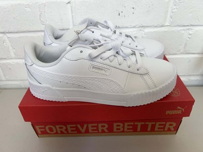 Lot Boxed pair of Puma crew snake trainers size UK...