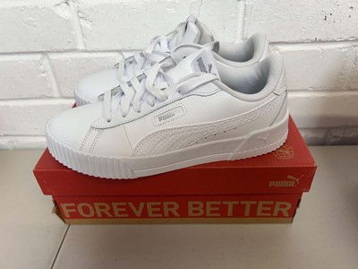 Lot Boxed pair of Puma crew snake trainers size UK...