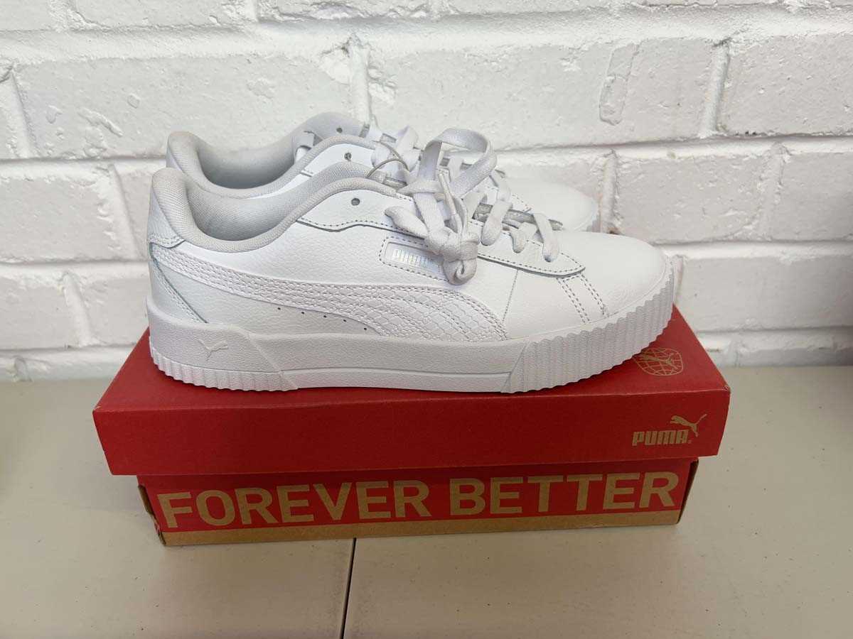 Lot Boxed pair of Puma crew snake trainers size UK...