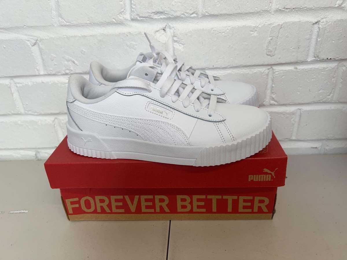 Lot Boxed pair of Puma crew snake trainers size UK...