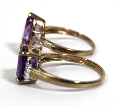 Lot 728 - Two 9ct yellow gold dress rings set purple and...