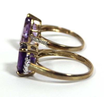Lot 728 - Two 9ct yellow gold dress rings set purple and...