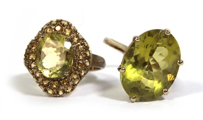 Lot 730 - Two 9ct yellow gold dress rings set yellow...