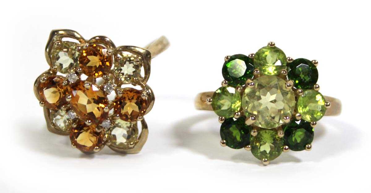 Lot 731 - Two 9ct yellow gold dress rings set green and...