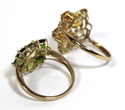 Lot 731 - Two 9ct yellow gold dress rings set green and...