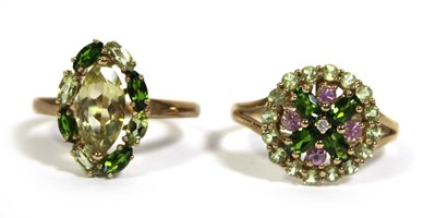 Lot 732 - Two 9ct yellow gold dress rings set green and...