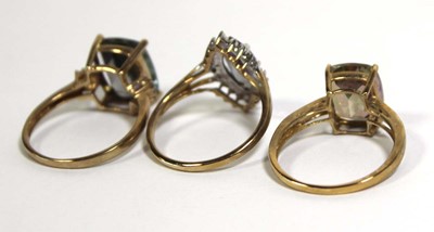 Lot 735 - Three 9ct yellow gold dress rings set...