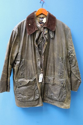 Lot 1213 - Barbour wax jacket (44) together with a...