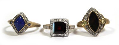 Lot 740 - Three 9ct yellow gold dress cluster rings set...