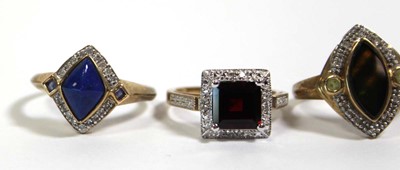 Lot 740 - Three 9ct yellow gold dress cluster rings set...