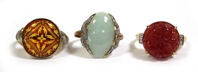 Lot 741 - Three 9ct yellow gold dress rings set pale...
