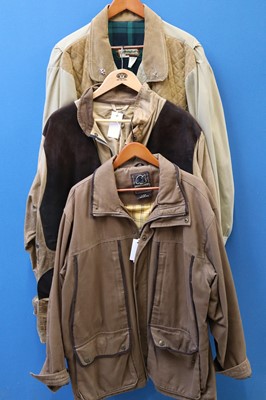 Lot 1257 - Three brown shooting jackets by Runnarköp (44),...