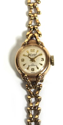 Lot 473 - A ladies 9ct yellow gold wristwatch by...