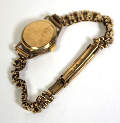 Lot 475 - A ladies 9ct yellow gold wristwatch by Rotary,...