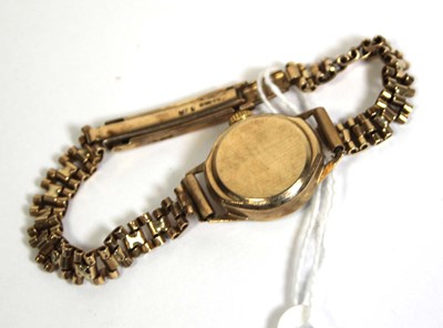 Lot 475 - A ladies 9ct yellow gold wristwatch by Rotary,...