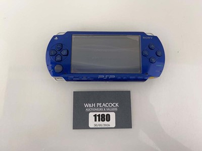 Lot 1180 - Sony PSP in blue with charger, boxed Aliens vs...