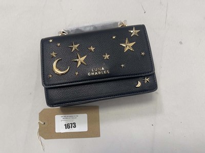 Lot 1673 - Luna Charles nova star studded handbag in...