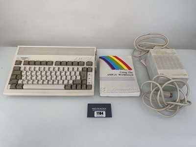 Lot 1184 - Amiga Commodore A600 with psu and user guide